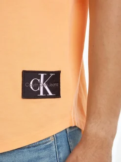 BADGE ROUND HEM TEE crushed orange