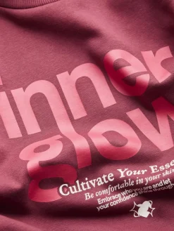 JXMIMI RLX LS PRINT CREW SWT cabernet